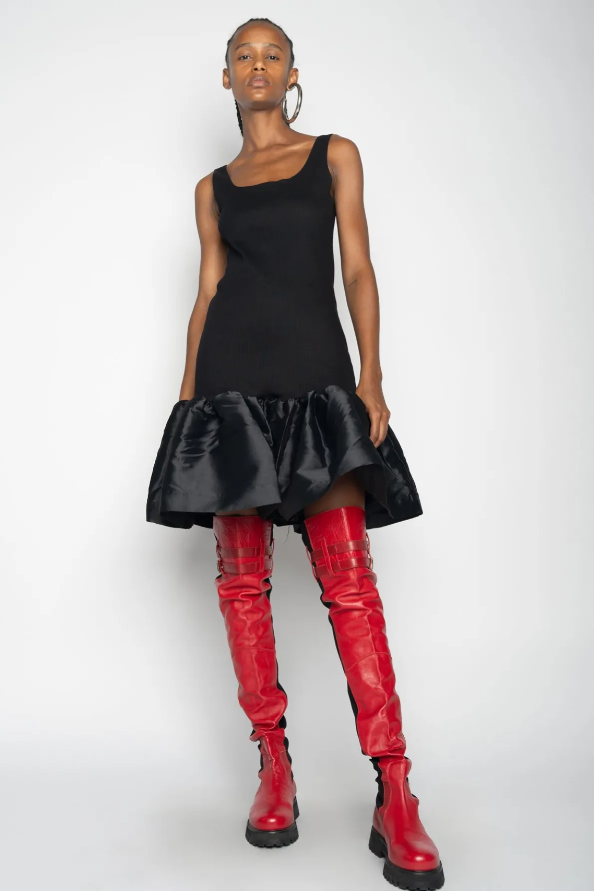 BLACK SLEEVELESS PUFF HEM DRESS