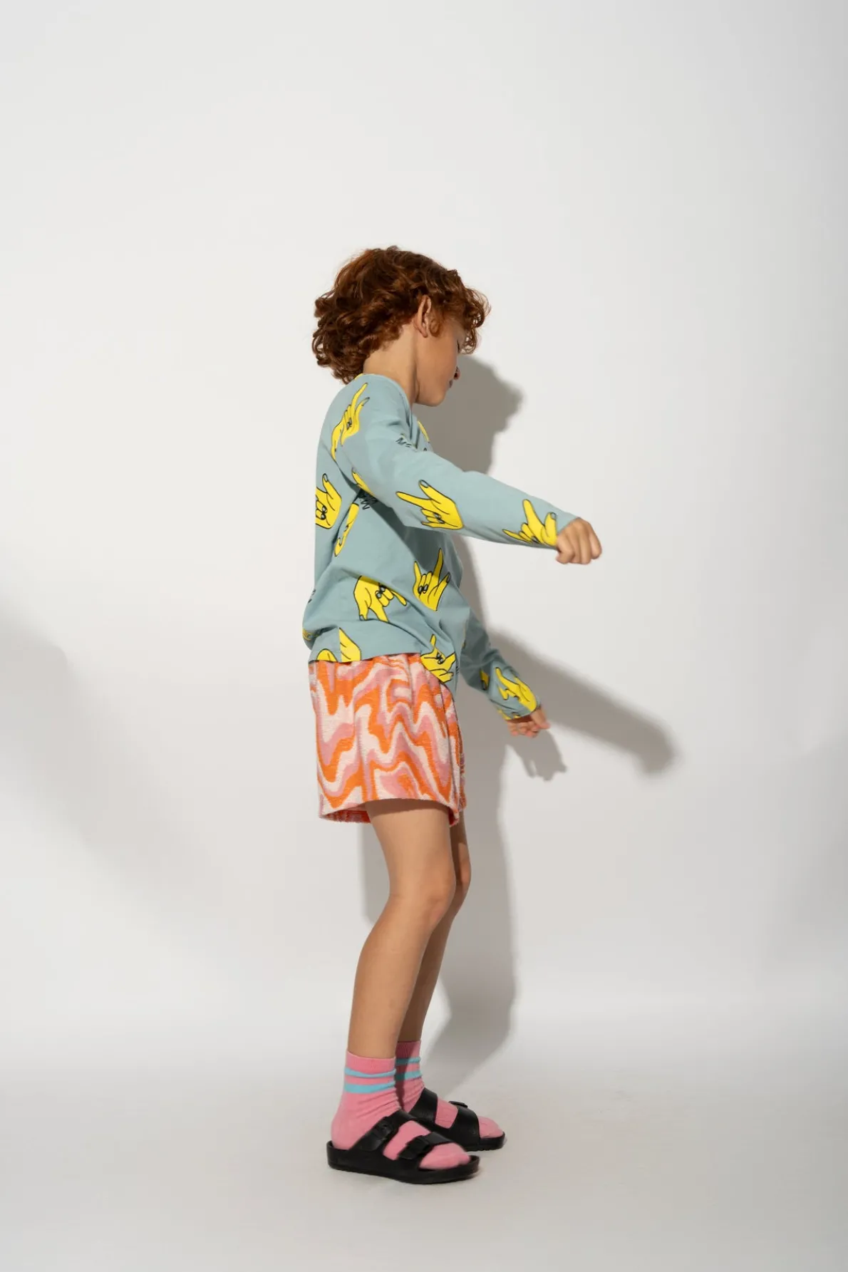 TURQUOISE HANDS PRINT LONG SLEEVE TOP